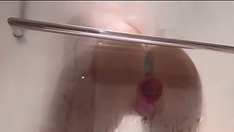 Get Ready To Be Drenched In Lust With This Shower Dildo Fuck Video