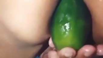 Stepmom Shows Off Her Open Ass By Using A Large Cucumber