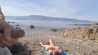 A Daring Exhibitionist Reveals His Penis To A Nudist Mother On The Beach, Who Proceeds To Perform Oral Sex