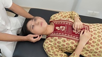 A Slender Asian Girl Gives A Sensual Massage In Her Dorm Room